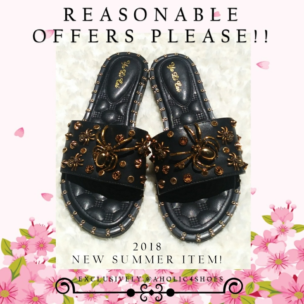 Black Flats With Gold Spider Embellishments.
